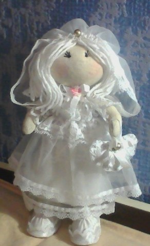 Текстильная кукла в стиле Т. Коннэ
