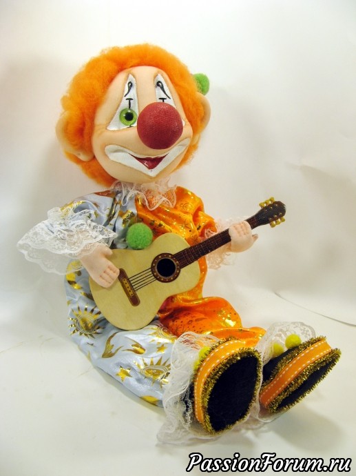 Клоун-гитарист