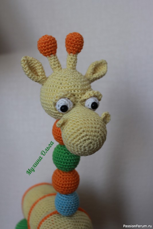 Развивающая игрушка жираф Анюта.